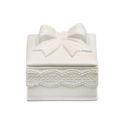 China High Quality Sustainable Decorative White Candy Box Bowknot Ornament Ceramic Box for sale