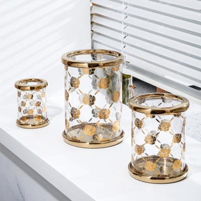 China Home Decoration Gold Rim Cylindrical Clear Candle Jar With Lid Flower Luxury Decal Glass Candle Jars for sale