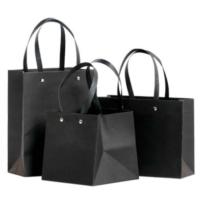 China New Handmade Promotional Cardboard Printed Your Own Logo Shopping Paper Bag for sale