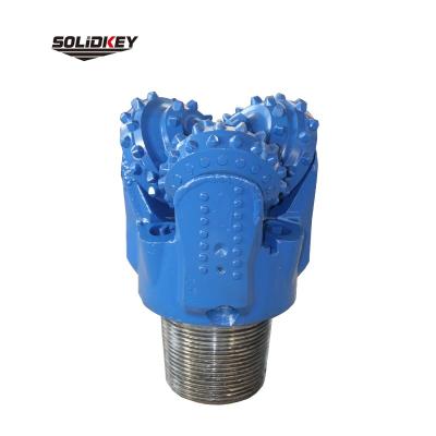 China Drilling and Oil Well Drilling Water Wells Best Price 9 7/8 IADC537 High Quality Tricone Bit Head / Oil Rig Drill Bit for sale