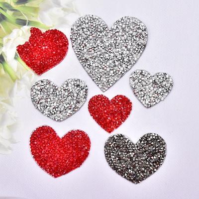 China Resin Crystal Heart Shape Flatback Iron On Rhinestone Pattern Applique Rhinestone Trimming Hot Fix Patches For Garment Shoe Bags Accessories for sale