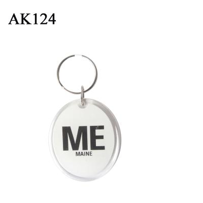 China Acrylic Promotional Oval Acrylic Photo Key Holder for sale