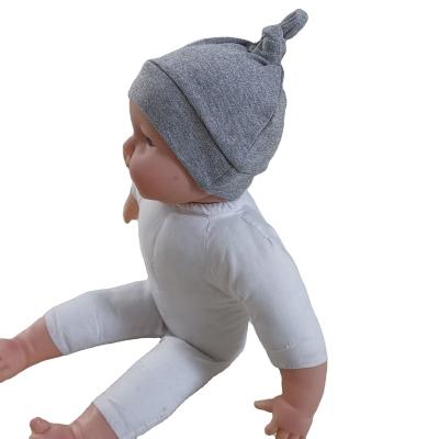 China Character Best Selling 0-24 Months Cozy Cotton Knitted Baby Beanie Cute Knot Hat Fancy Solid Color for sale