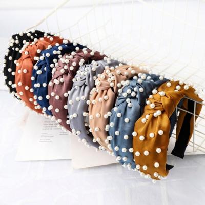 China Retro fashion fabric wide-brimmed headband simple wave nodding headband hairpin fashion pearl headband for sale