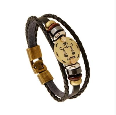 China Vintage Libra Gold Charm Leather Bracelet Bead Black Wooden Buckle Men And Women Lovers Leather Bracelet BH-155 for sale