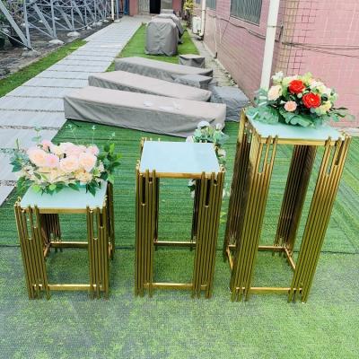 China Decorative Party Centerpiece Gold Stainless Steel Flower Backdrop Stands Pedestal For Weddings for sale