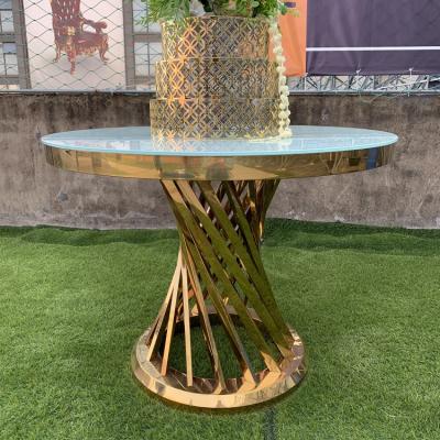 China Hot Selling Stainless Steel Adjustable Gold Round Frame Small Coffee Table Glass Top Cake Table Wedding(Other) for sale