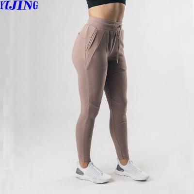 China Breathable Women's High Waisted Sweatpants Drawstring Women Joggers With Pockets Sport Jogger Workout Pants for sale