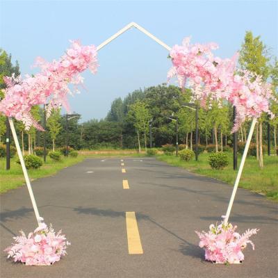 China Eco-friendly Wedding Arch Props Frame Wrought Iron Arch Shelf Wedding Stage Backdrop Layout Decor Road Guide Outdoor Flower Stand for sale