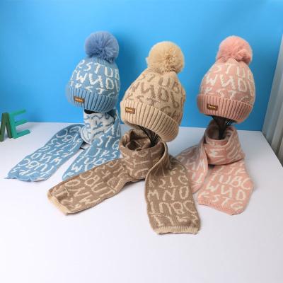 China Newest Designer Long Winter Letter Print Full Knit Beanies Fur Pom Pom Kids Hat Scarf Two Piece Set for sale