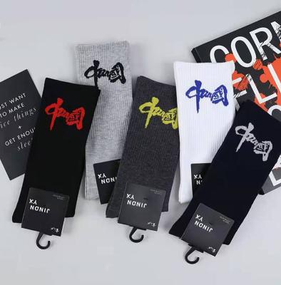 China Athletic Male Breathable Mens High Elastic Sports Socks Crew Letter Athletic Socks for sale