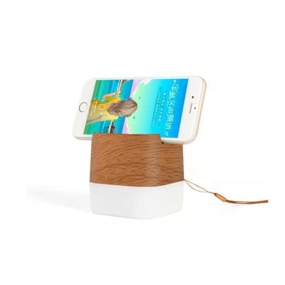 China AirPlay Concise Design Portable Wireless Speaker with Built-in Light Phone-Bottom and Smart Stand for sale