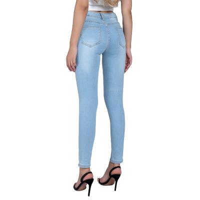 China Factory Supply Blue Women's Breathable Stretch Pencil Pants Ripped Skinny Blue Shredded Jeans for sale