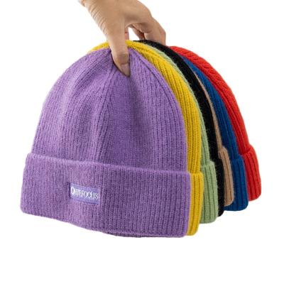 China 2020 COMMON hot selling acrylic knit winter beanie hats wholesale custom made winter hats with embroidery for sale