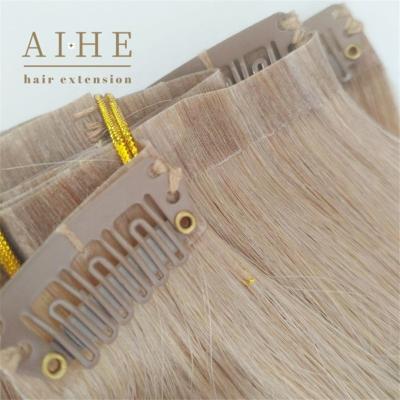 China Hot Selling Silky Straight PU Ombre Blonde Real Hair 100% Seamless Clip In Hair Extensions for sale