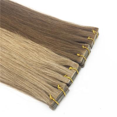 China High Quality Silky Straight Brown Brazilian Skin Wave Tape Hair Weft Extension for sale