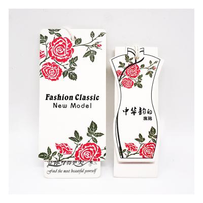 China Recyled Multicolor Optional Fashion Ivory Board Embossing Black Stamping Custom Designer Hang Tag For Clothing Own Logo for sale