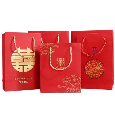 China Custom Folding Recycled Logo Personalized Paper Packing Bags Reusable Materials Shopping for sale