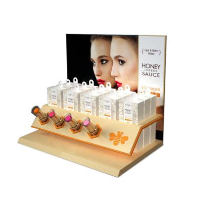 China 2021 Hot Sale Luxury Custom Logo Acrylic Cosmetics Display Stand Eyelash Counter Display For Chain Stores for sale