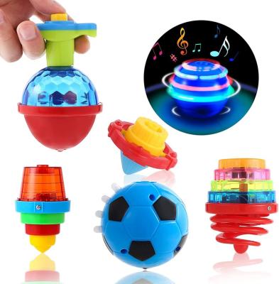 China Kids Magical Wiggling Little Person Flash Spinner Toys Finger Colorful Luminous Music Rotating Gyro Compass Gift Toys for sale