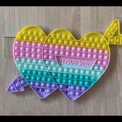 China Toy Kids Large Rainbow Anti Decompression Wholesale Valentine Heart Pop Itting Fidget Sensory Relaxation Push Up Bubble Toys for sale