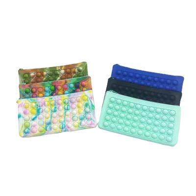 China Relieve Stress Anti-Anxiety Noise Itting Storage Bag Wholesale Silicone Children School Bags Kids Girls Jumping Push Bubble Purses Wiggle Coin Purse for sale