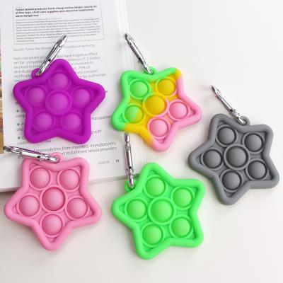 China Eco-friendly Shape Material Wholesale Star Shape Rainbow Star Key Chain Sets Manufacturers Relaxation Other Pop Cute Cheerful Person Kawaii Child Silicon Key Chain for sale