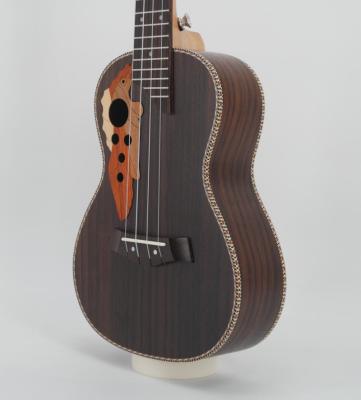 China 23 Inch Rosewood Grape Hole Ukulele Rose Guitar Wholesale Price for sale