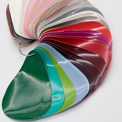 China Abrasion-Resistant Colored Artificial Mirror PVC Fabric PU Leather Material For Ladies Men Dress Shoes Gentlemen Shoes for sale