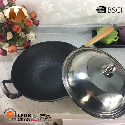 China Sustainable cast iron preseasoned wok with stainless steel lid for sale