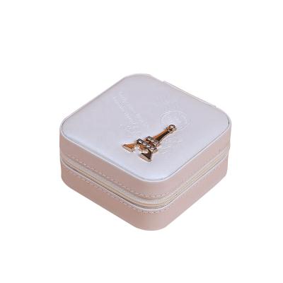 China Portable Eco-friendly Jewelry Storage Box with Mirror Mini Earring Necklace Ring Organizer PU Beige Leather Jewelry Case for sale