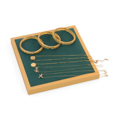 China New Design Green Durable Jewelry Display Trays Luxury Edge Bracelet Display Stand Golden Wood for sale