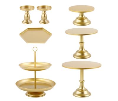 China 7 Pcs Gold Sustainable Cake Stands Metal Cupcake Stand Candlestick Dessert Display Dish Set Serving Tray for sale