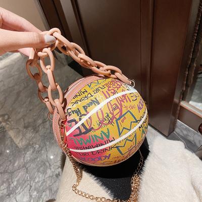 China High quality alphabet graffiti basketball cross - body bags for women 2021 fashion color girls handbags chain purses letter print ball bags for sale