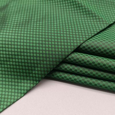 China Anti-Static Green PU Jacquard Fabric Coat Lining Fabric Black Silk Woven Rib Knit Fabric For Neck for sale