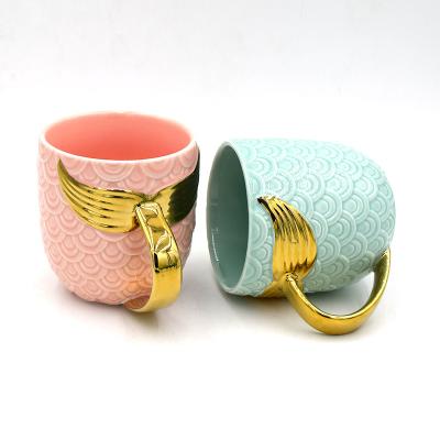 China Creative Mermaid Water Cup Luster Pearl Mermaid Tail Ceramic Cup Viable Handle Gold Ceramic Coffee Mug for sale