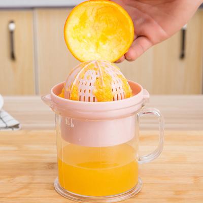 China Hot Selling New Product Kitchen Helper Detachable Four-in-one The Hand-pressing Multifunctional Plastic Citrus Juicer for sale