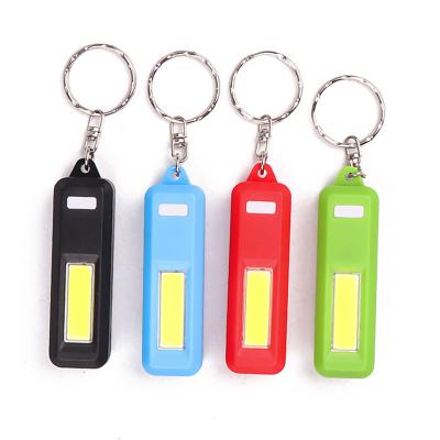 China Mini Key Chain COB Light Flashlight For Keychains Portable Super Bright Light Flashlight Dry Battery Main Chain Small Tactical Flashlight For Kids for sale