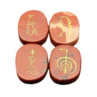 China Feng Shui Red Stone Healing Feng Shui Natural Jasper Engraved Chakra Set Reiki Sold by 4pcs for sale