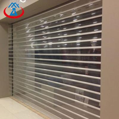 China Sturdy and Durable/Flexible/Convenient/Fashionable Commercial Clear Polycarbonate Slat Roller Shutter Door for sale