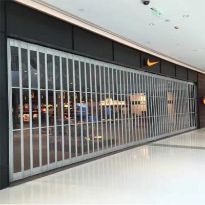 China Security Commercial Store Front Side Folding Door Polycarbonate Aluminum Folding Door for sale