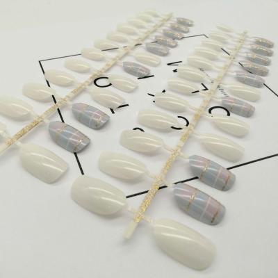 China Solid Color And Gold Line Printed Oval Shape Nail Design Mixed Design Ins Decoration Fashion Nail Press On Fingers for sale