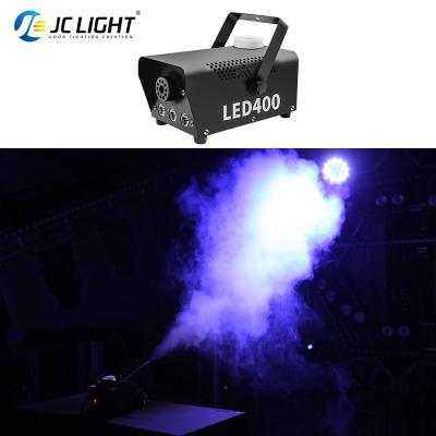 China Bar Jc 500W RGB Dry Ice Smoke Fog Machine Stage Light For Wedding Party Stage With Remote Control Fog Machine for sale