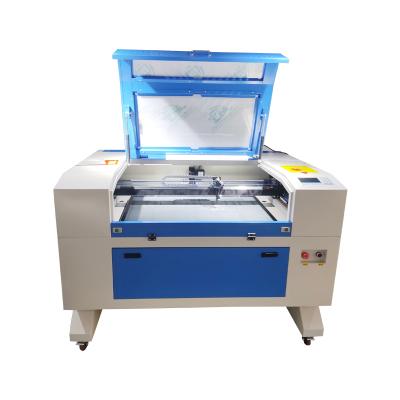 China Water Cooled 60w Laser Cut Engrave Machine For Hot Stamping Wood Metal Plate Cutting for sale