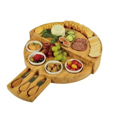 China Best Gift Bamboo Tray Multi-function Round Shape Cheese Cutting Board with Knife Set for sale