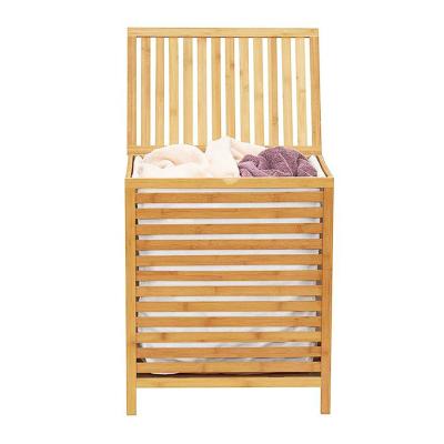 China ODM Portable Bamboo Laundry Hamper Basket With Lid Shelf for sale