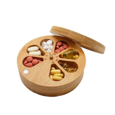 China Functional and Durable Bamboo Daily Travel Round Pill Organizer with Days of the Week for sale