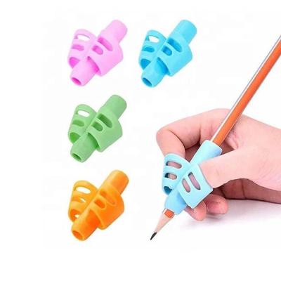 China Training Practice Grip Pen Writing Aid Pencil Grips same as picture for sale