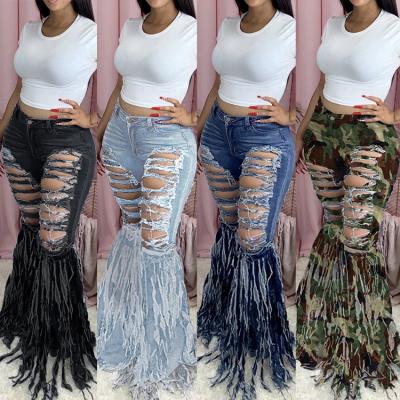 China Breathable 2XL Size Plus Size Breathable Explosive Style Fringed Tassel Leg Ripped Bell Bottom Jeans Women's Denim Pants for sale