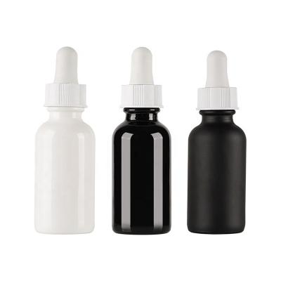 China Wholesale China Cosmetic 15ml 30ml 60ml Boston Round Glass Bottle Essential Oil Black White Frosted Bottle With Dropper for sale